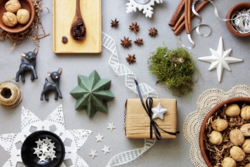 christmas-decor-craft-and-food-on-grey-paper-from-above-picture-id513569501 (1).jpg